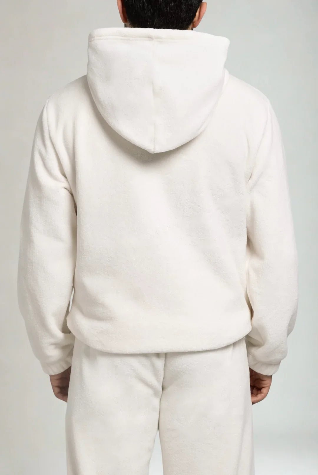 Sweat premium pour femme couleur crème présenté à plat sur fond neutre.